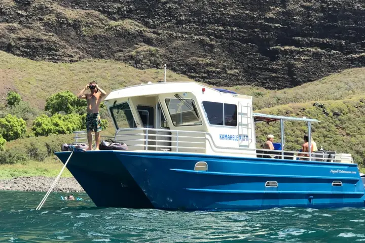 a small boat in a body of water